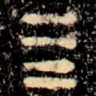 亖